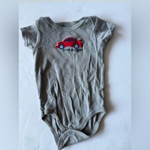 Gray onesie with car on it says zoom